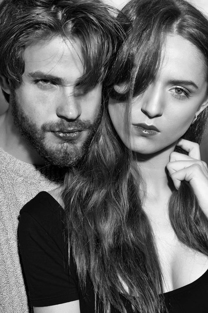 Young couple of pretty girl and bearded man - Valokuva, kuva