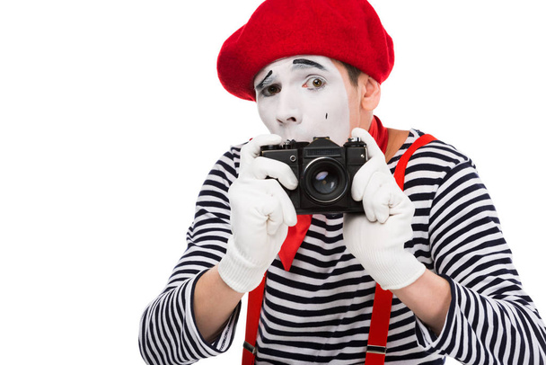 scared mime taking photo with film camera isolated on white - Foto, Imagem