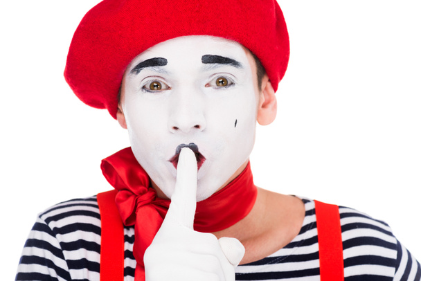 portrait of mime showing silence gesture isolated on white - Photo, Image