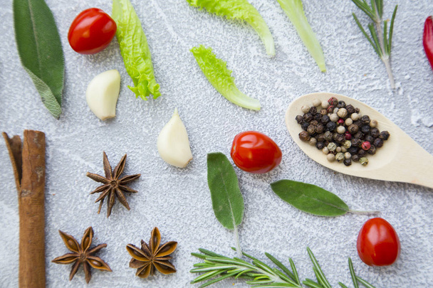 Set of spices and herbs on light stone background - Fotoğraf, Görsel