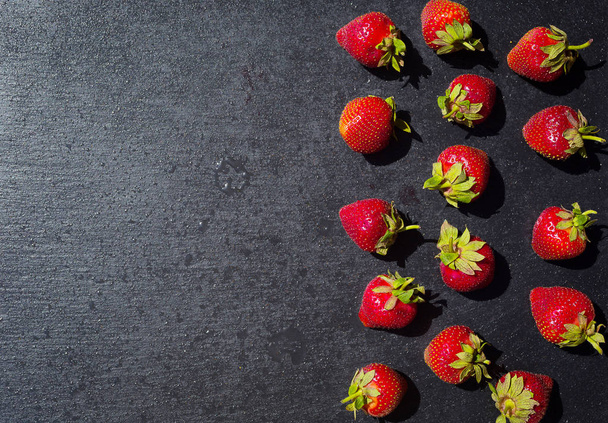 strawberries on stone background, delicious first class organic fruit as a concept of summer vitamins - Photo, Image