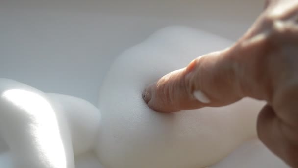 Womans hand draws circles on the foam - Footage, Video