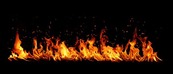 Blazing flames over black background - Fotoğraf, Görsel