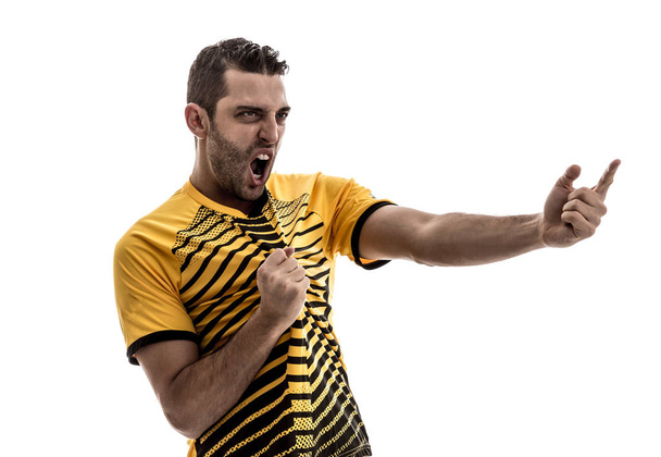 Футбольний вентилятор з жовтою сорочкою, що святкує на білому тлі
 - Фото, зображення