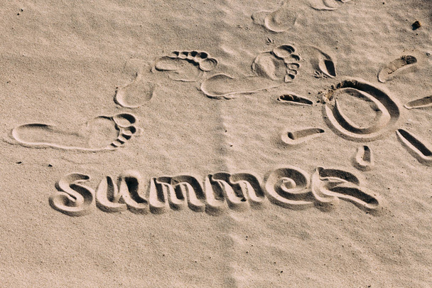 Word "Summer" on the sand - 写真・画像