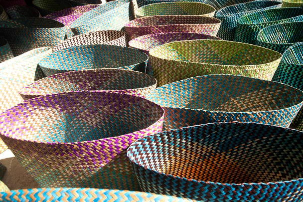 Colorful basket of dry plant fern Lygodium ( Yan Lipao ). - Zdjęcie, obraz