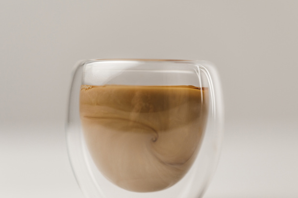 Double Walled Glass cup with coffee and milk on white background - Photo, Image