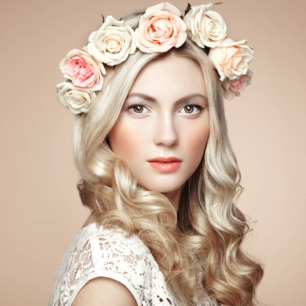 Beautiful blonde woman with flower wreath on her head  - Zdjęcie, obraz