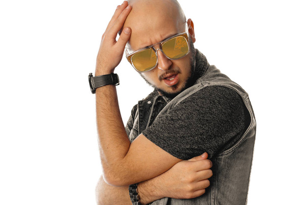 Sensual unshaved man in sunglasses posing with opened mouth - Zdjęcie, obraz