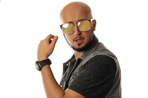studio portrait of Gorgeous young macho in sunglasses posing - Photo, Image