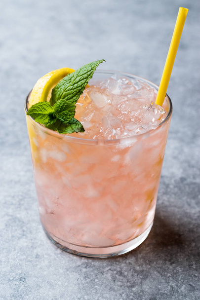Pink Cocktail with Crushed Ice, Mint and Lemon - Fotoğraf, Görsel