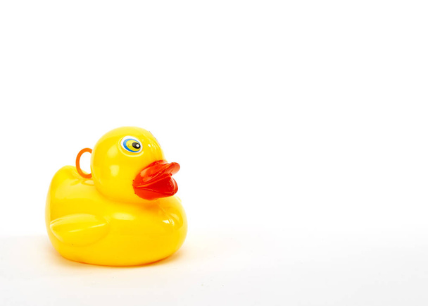 yellow bath duck on white background - Foto, afbeelding
