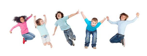 Niños saltando toguether aislados sobre un fondo blanco - Foto, imagen