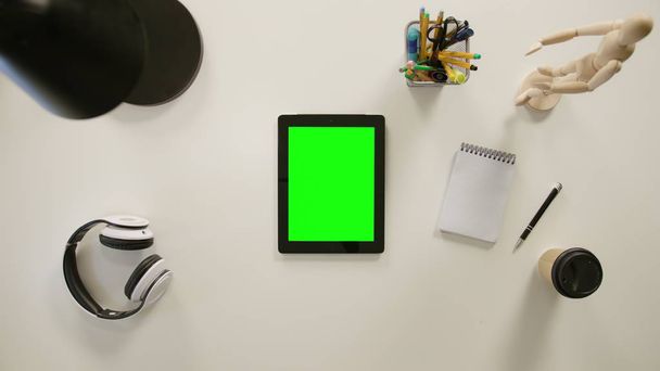 A Finger Touching a Green Screen of the iPad - Foto, Imagem