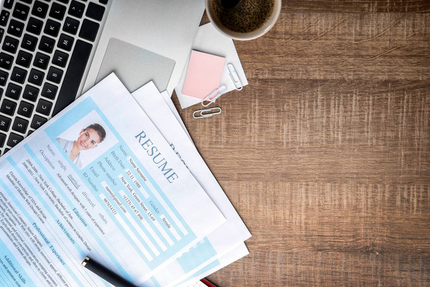 Resume forms with laptop on table. Job interview concept - Foto, Imagem