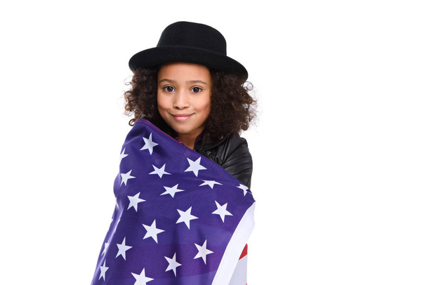 beautiful little child in hat covered in usa flag isolated on white - Valokuva, kuva
