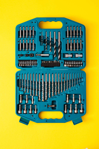 Set tools box on yellow - Foto, afbeelding