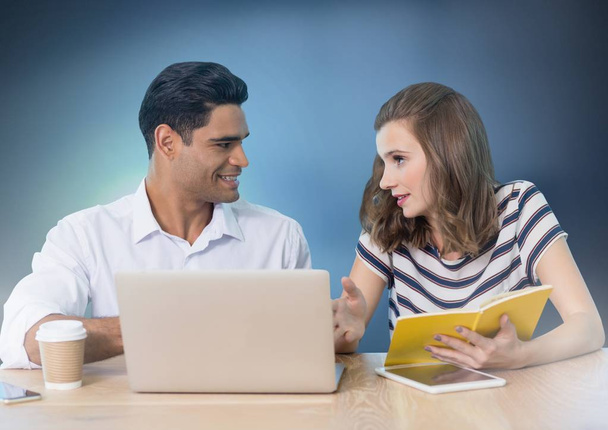 Digital composite of Business couple working on laptop - Photo, Image