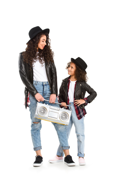 stylish mother and daughter with vintage boombox isolated on white - Photo, Image