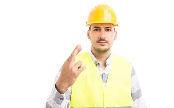 Constructeur ou constructeur faisant geste de malchance
 - Photo, image