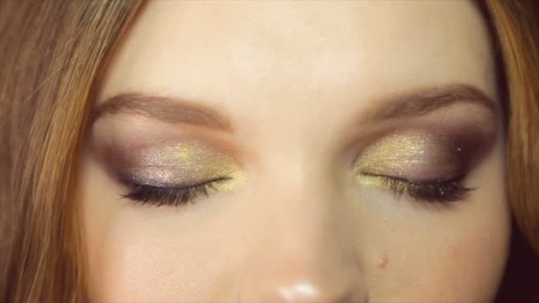 Eyes of a young woman with makeup - Záběry, video