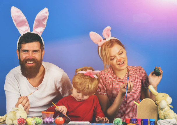 Man, woman and kid wearing bunny ears. Holiday spirit - Zdjęcie, obraz