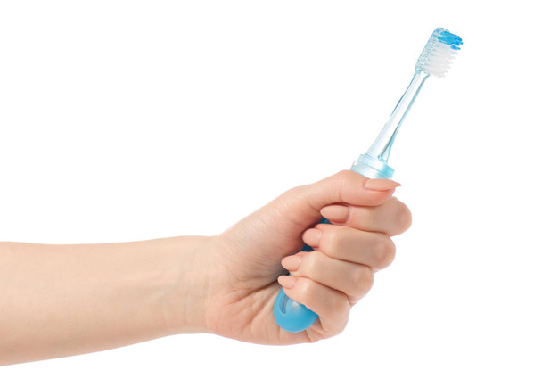 Travel blue toothbrush in hand - Photo, image