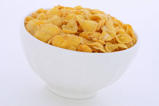 Desayuno saludable de hojuelas de maíz
  - Foto, imagen