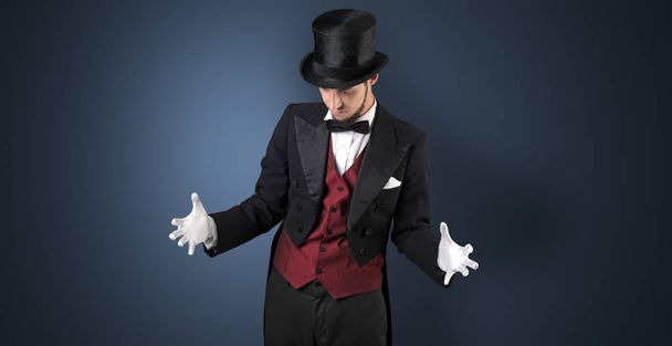 Magician holds something invisible  - Valokuva, kuva