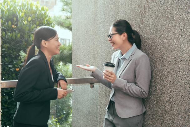 Asian women chatting talking together - Foto, immagini
