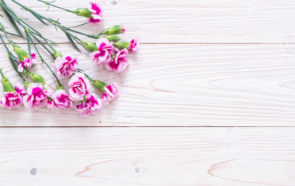 pink spring flower on wooden background - 写真・画像