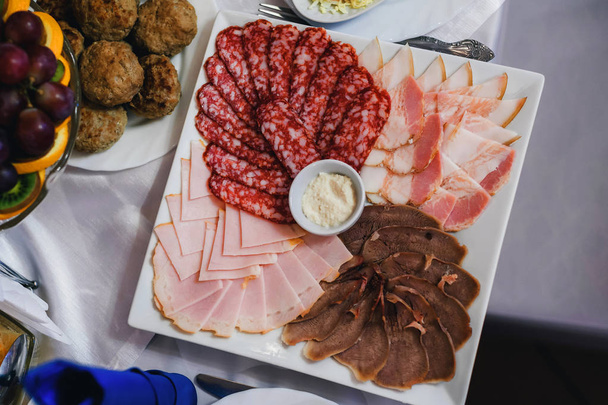 bacon, sausage, ham and cold cuts on the Breakfast - Photo, Image