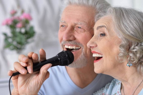 senior couple husband and wife singing songs - Photo, Image