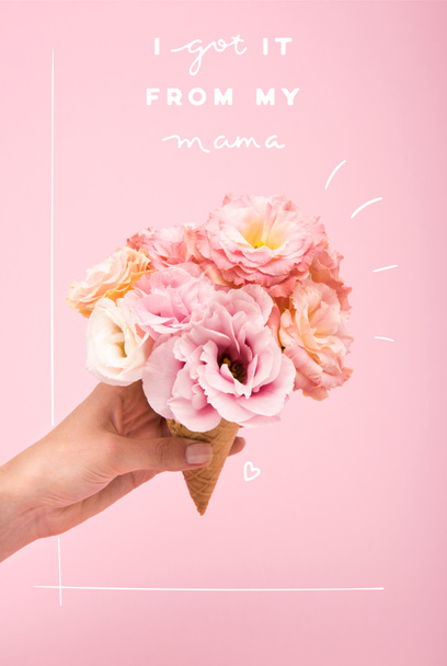 mothers day greting card with person holding waffle cone with beautiful blooming flowers isolated on pink - Photo, Image