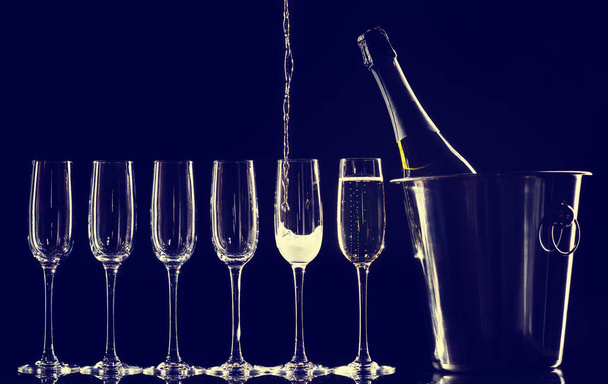 Champagne glasses set on black background - Фото, зображення