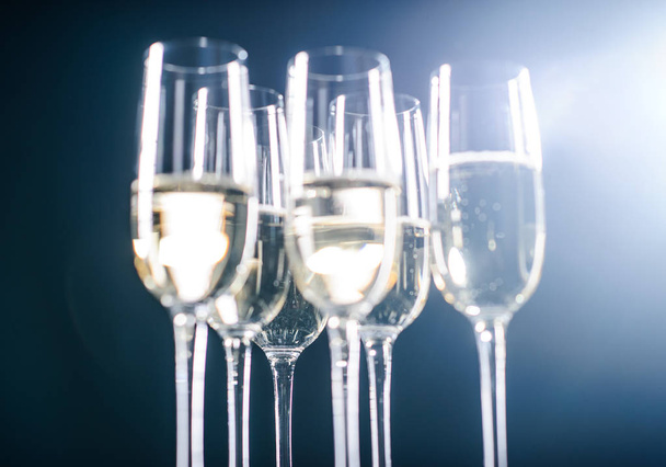 Champagne glasses set on black background - Fotó, kép