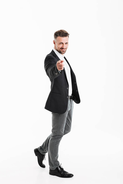 Full length portrait of a cheerful mature businessman - Foto, afbeelding
