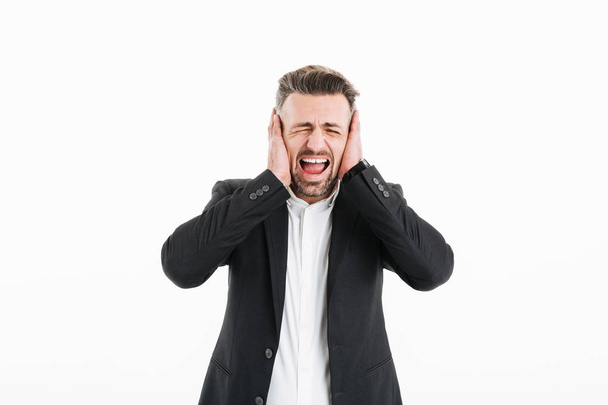 Photo of businessman in suit with closed eyes screaming and cove - Foto, imagen