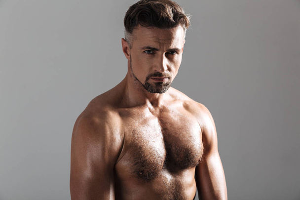 Close up portrait of a muscular mature shirtless sportsman - Fotografie, Obrázek