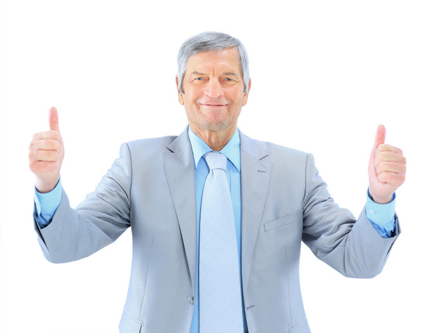 Businessman in age, shows that all is well. Isolated on a white background. - Foto, imagen