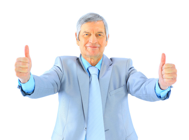 Nice businessman at the age, two thumbs up. Isolated on a white background. - Fotoğraf, Görsel