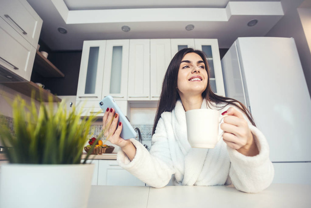 Girl with Smartphone and Coffe - Foto, imagen