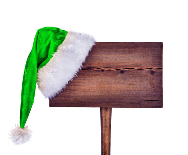 дерев'яний дорожній знак з капелюхом Санта ізольовано на білому тлі
 - Фото, зображення