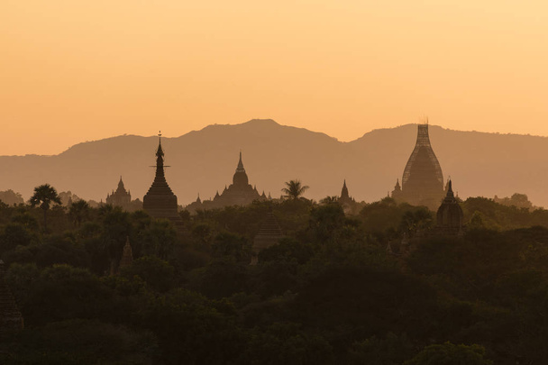 Ancient Temple in the Archaeological Park in Bagan at sunset, Myanmar - Photo, Image