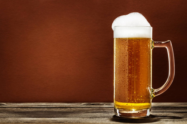A Glass Of Foaming Beer - Foto, immagini