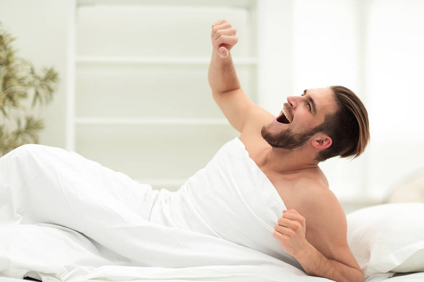 smiling man waking up in the morning - Fotoğraf, Görsel