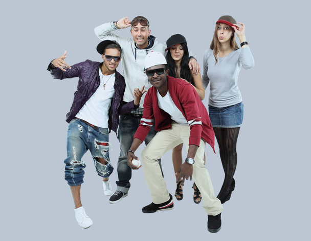 Happy teenagers having good fun time isolated on gray background - Foto, immagini