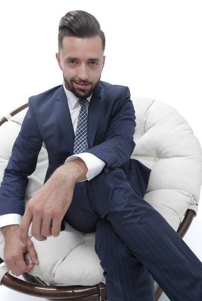 confident businessman sitting in a chair - Zdjęcie, obraz