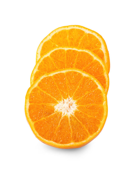 Half and slice of fresh orange fruit isolated on white backgroun - Фото, изображение