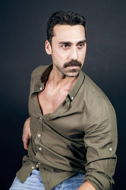 Young handsome man with beard and mustache studio portrait - Foto, Imagem